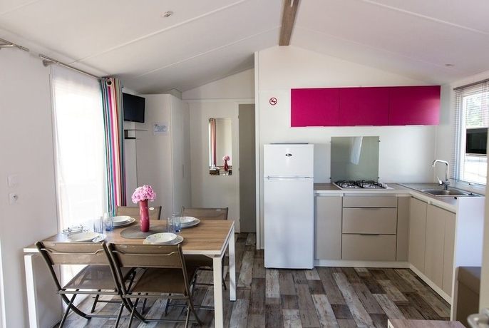 Imagen de la habitación del Hotel Camping La Palmyre Estanquet. Foto 18