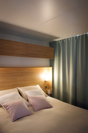 Imagen de la habitación del Hotel Camping L'abri Des Pins. Foto 11