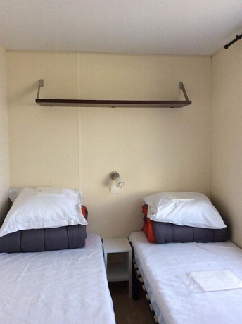 Imagen de la habitación del Hotel Camping Le Mont Joli Bois. Foto 8