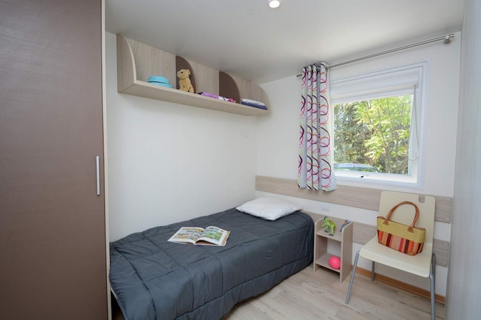 Imagen de la habitación del Hotel Camping Le Vieux Colombier. Foto 3