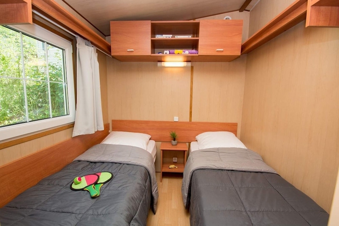 Imagen de la habitación del Hotel Camping Le Vieux Colombier. Foto 5