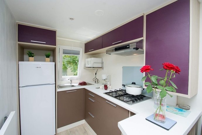 Imagen de la habitación del Hotel Camping Le Vieux Colombier. Foto 15