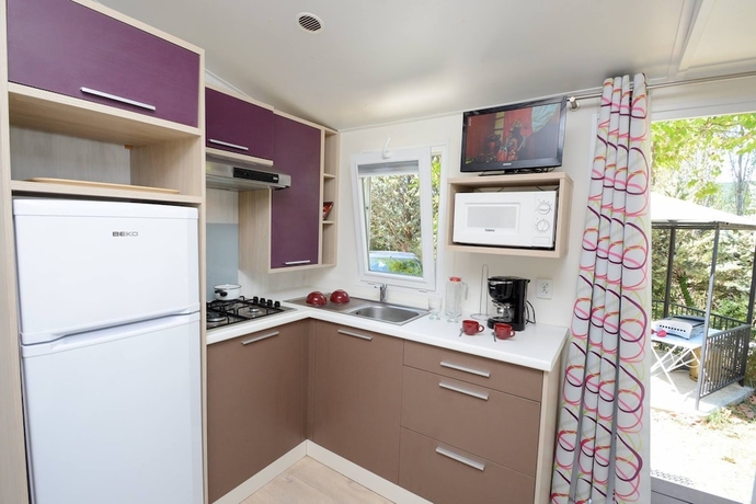 Imagen de la habitación del Hotel Camping Le Vieux Colombier. Foto 16