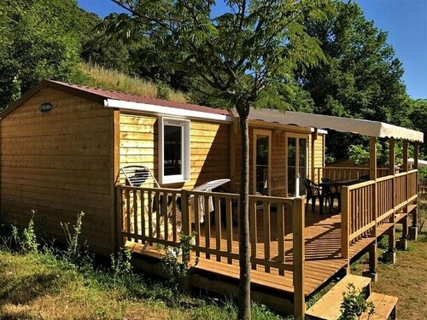 Imagen de la habitación del Hotel Camping Les Cerisiers du Jaur. Foto 19