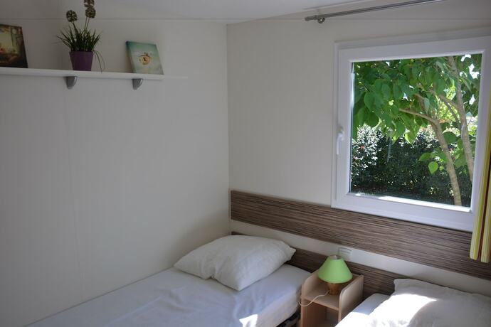 Imagen de la habitación del Hotel Camping Les Chenes Clairs. Foto 15