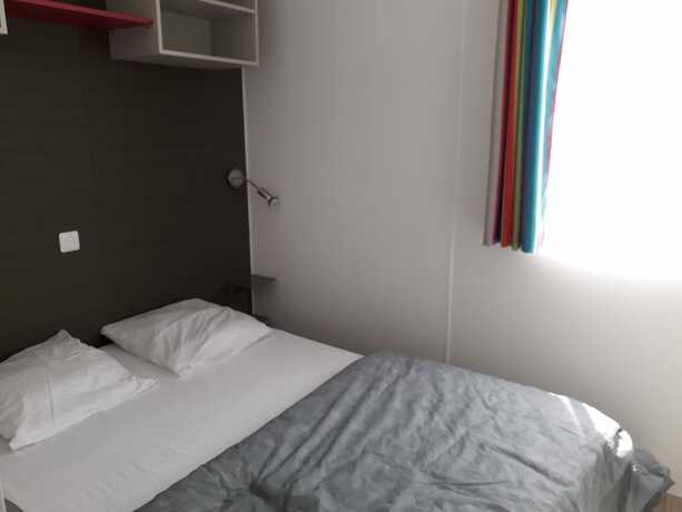 Imagen de la habitación del Hotel Camping Les Peupliers. Foto 11