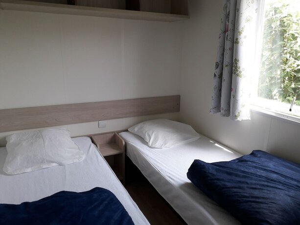 Imagen de la habitación del Hotel Camping Les Peupliers. Foto 12