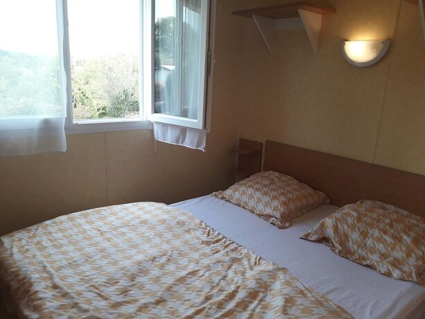 Imagen de la habitación del Hotel Camping Les Peupliers. Foto 14