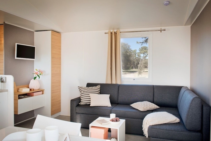 Imagen de la habitación del Hotel Camping Les Places Dorees. Foto 8