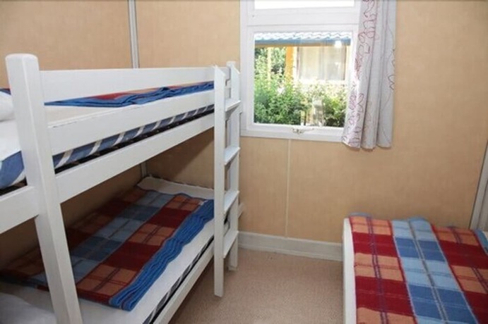 Imagen de la habitación del Hotel Camping Les Ruli&egrave;res. Foto 16