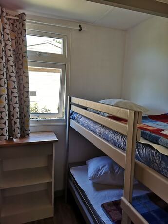 Imagen de la habitación del Hotel Camping Les Ruli&egrave;res. Foto 17