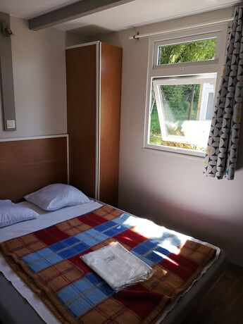 Imagen de la habitación del Hotel Camping Les Ruli&egrave;res. Foto 18