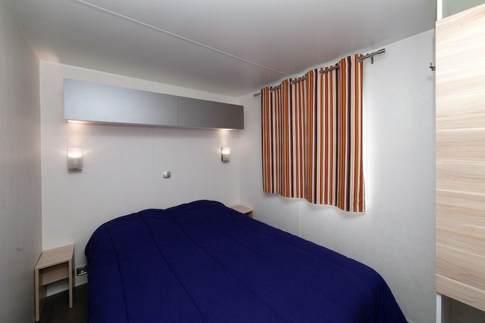 Imagen de la habitación del Hotel Camping Merendella. Foto 13