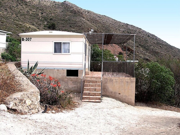 Imagen de la habitación del Hotel Camping Naturista El Port&uacute;s. Foto 11