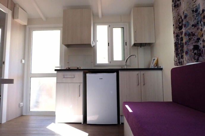 Imagen de la habitación del Hotel Camping Naturista El Port&uacute;s. Foto 18