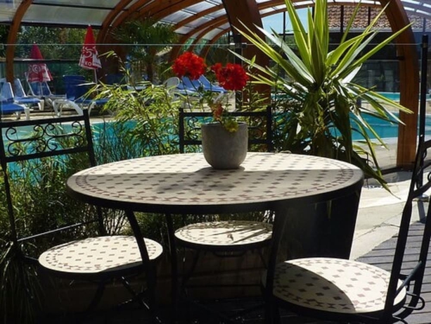 Imagen de los exteriores del Hotel Camping Pommiers des Trois Pays. Foto 12