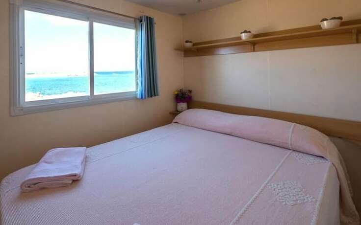 Imagen de la habitación del Hotel Camping Village Abbatoggia. Foto 18