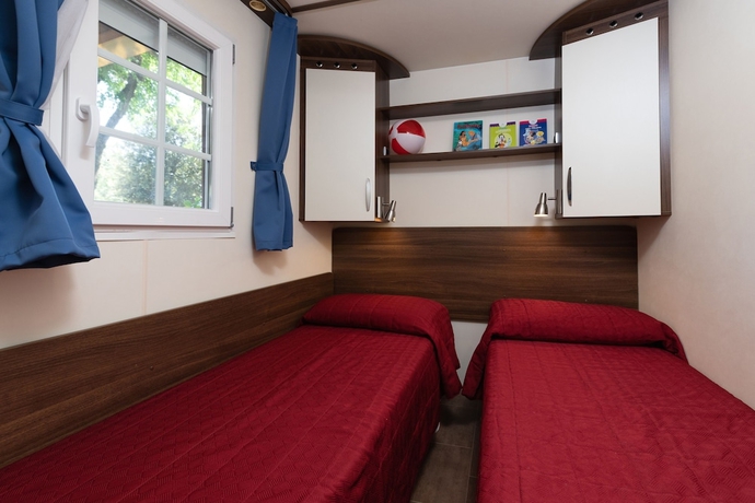 Imagen de la habitación del Hotel Camping Village Garden Paradiso. Foto 7