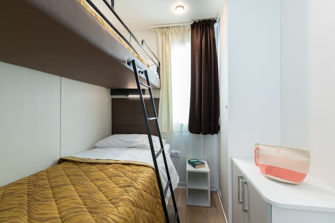 Imagen de la habitación del Hotel Camping Village Garden Paradiso. Foto 17