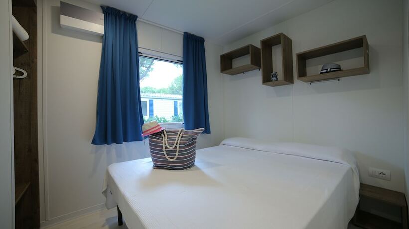 Imagen de la habitación del Hotel Camping Waikiki. Foto 19