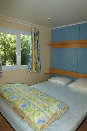 Imagen de la habitación del Hotel Camping du Bourg. Foto 16
