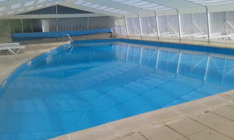 Imagen de la piscina del Hotel Camping le Repaire - Les Chalets. Foto 16