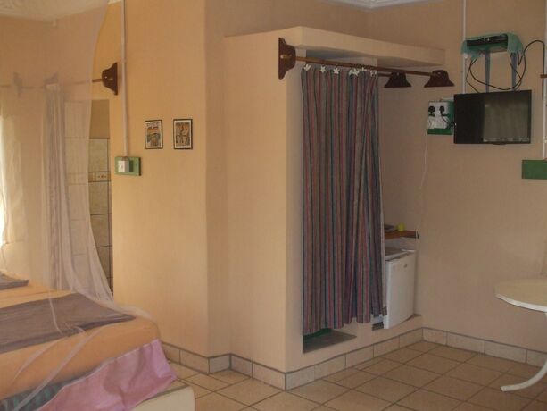 Imagen de la habitación del Hotel Camping-Sukuta and Lodge. Foto 15