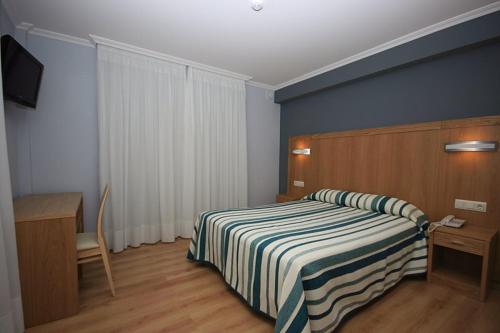 Imagen de la habitación del Hotel Campomar, Lanzada. Foto 6