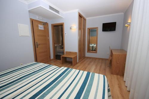 Imagen de la habitación del Hotel Campomar, Lanzada. Foto 8