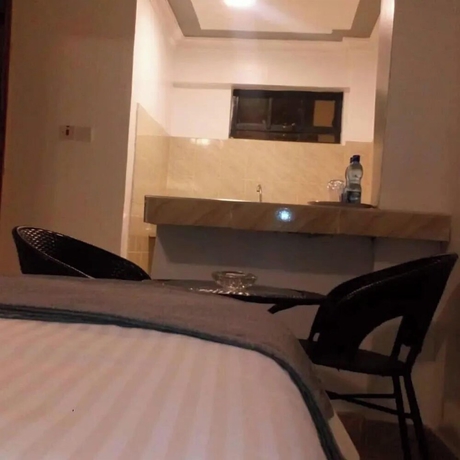 Imagen de la habitación del Hotel Camsupreme Studios Meru. Foto 2