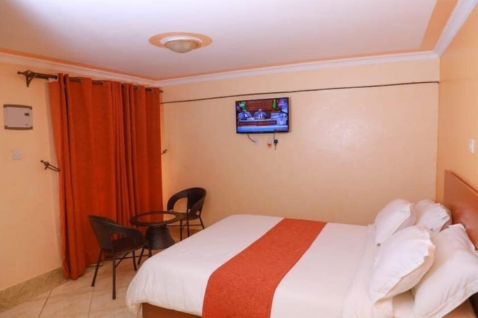 Imagen de la habitación del Hotel Camsupreme Studios Meru. Foto 3