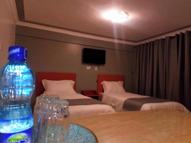 Imagen de la habitación del Hotel Camsupreme Studios Meru. Foto 5
