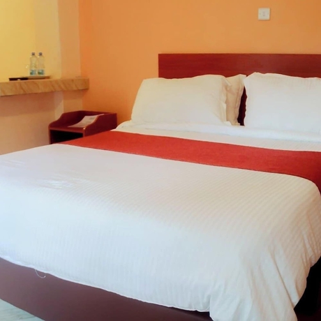 Imagen de la habitación del Hotel Camsupreme Studios Meru. Foto 6