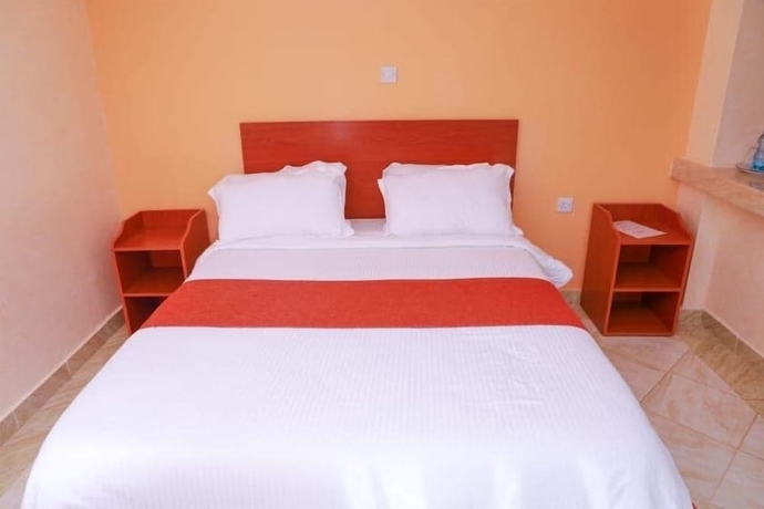 Imagen de la habitación del Hotel Camsupreme Studios Meru. Foto 7