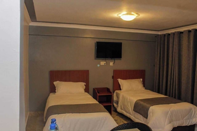 Imagen de la habitación del Hotel Camsupreme Studios Meru. Foto 8