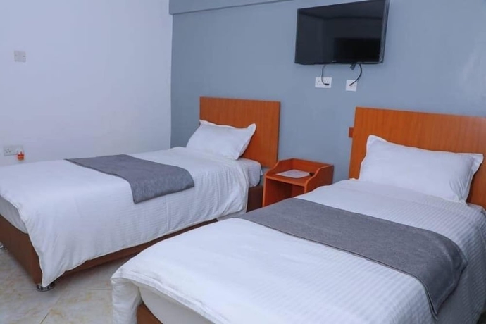 Imagen de la habitación del Hotel Camsupreme Studios Meru. Foto 9
