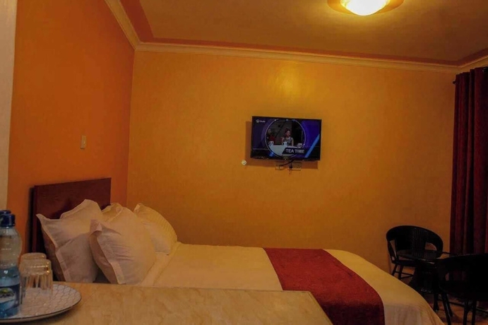 Imagen de la habitación del Hotel Camsupreme Studios Meru. Foto 10