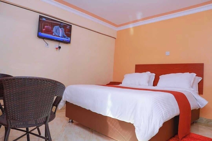 Imagen de la habitación del Hotel Camsupreme Studios Meru. Foto 11