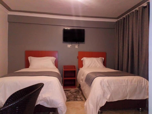 Imagen de la habitación del Hotel Camsupreme Studios Meru. Foto 12