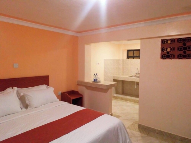 Imagen de la habitación del Hotel Camsupreme Studios Meru. Foto 14