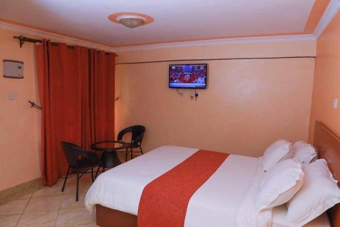 Imagen de la habitación del Hotel Camsupreme Studios Meru. Foto 15