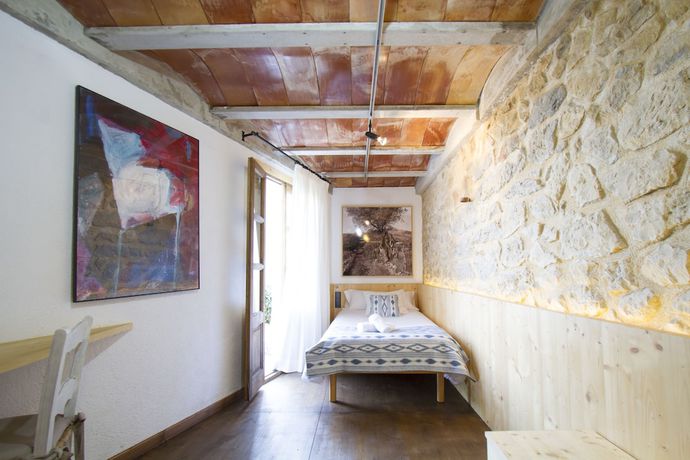 Imagen de la habitación del Hotel Can Cota Suites and Spa - Turismo de interior. Foto 4