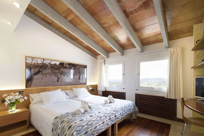 Imagen de la habitación del Hotel Can Cota Suites and Spa - Turismo de interior. Foto 18
