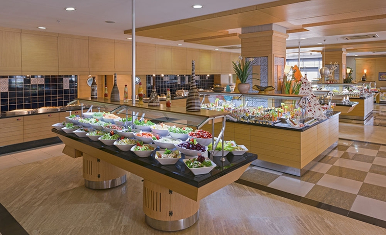 Imagen del bar/restaurante del Hotel Can Garden Resort. Foto 6