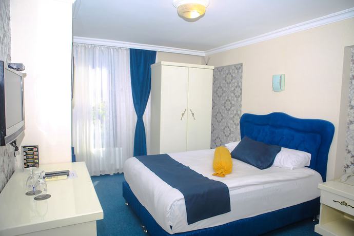 Imagen de la habitación del Hotel Can Grand Hotel. Foto 6
