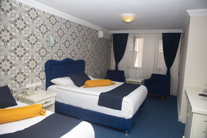 Imagen de la habitación del Hotel Can Grand Hotel. Foto 7
