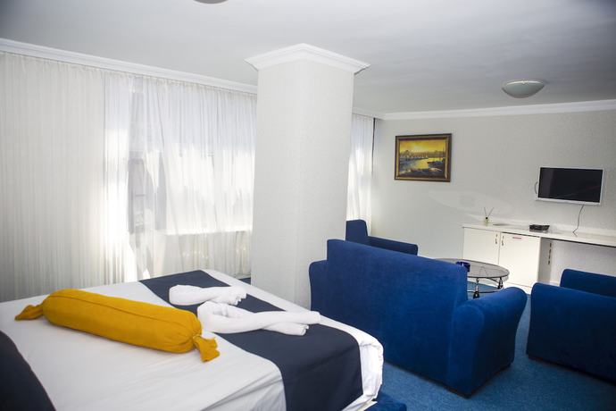 Imagen de la habitación del Hotel Can Grand Hotel. Foto 8