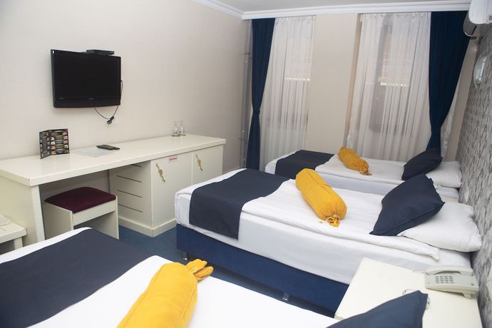 Imagen de la habitación del Hotel Can Grand Hotel. Foto 9