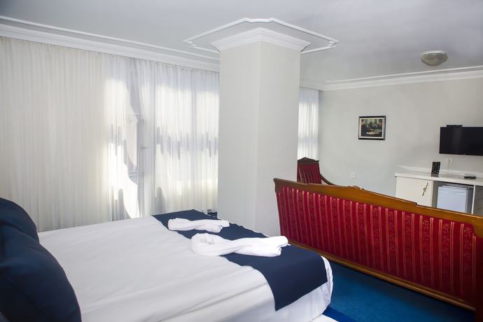 Imagen de la habitación del Hotel Can Grand Hotel. Foto 10