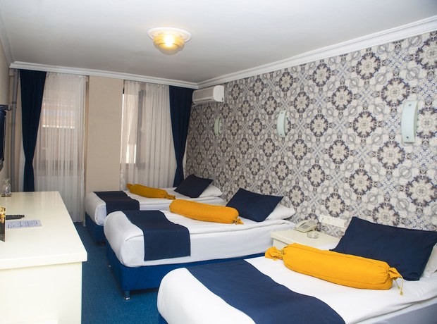 Imagen de la habitación del Hotel Can Grand Hotel. Foto 11
